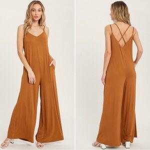 NWOT NEVER WORN MUSTARD ONE PEICE SUPER SOFT JUMPSUIT WITH POCKETS!
